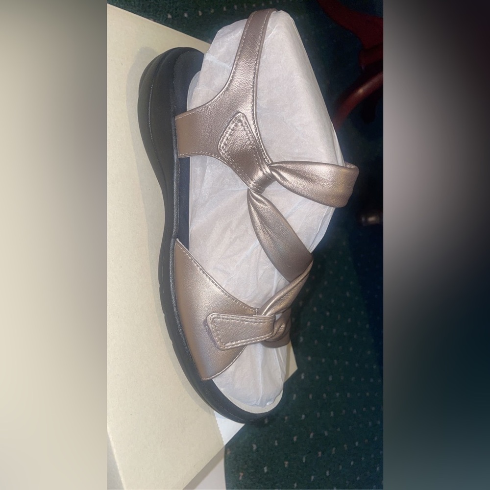 Sandals. Metallic. Size 8. Very comfortable. Never worn